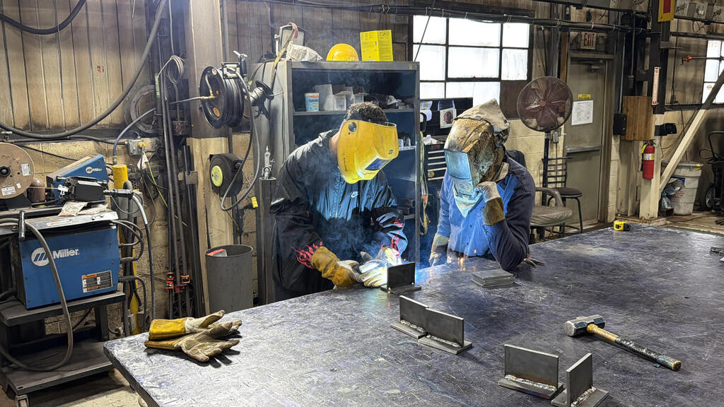 Student welding 
