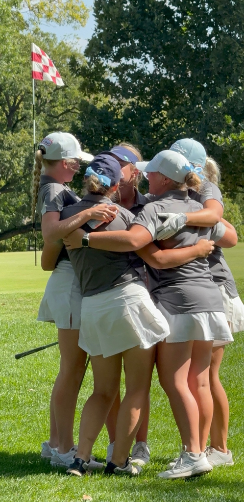 golf team hug