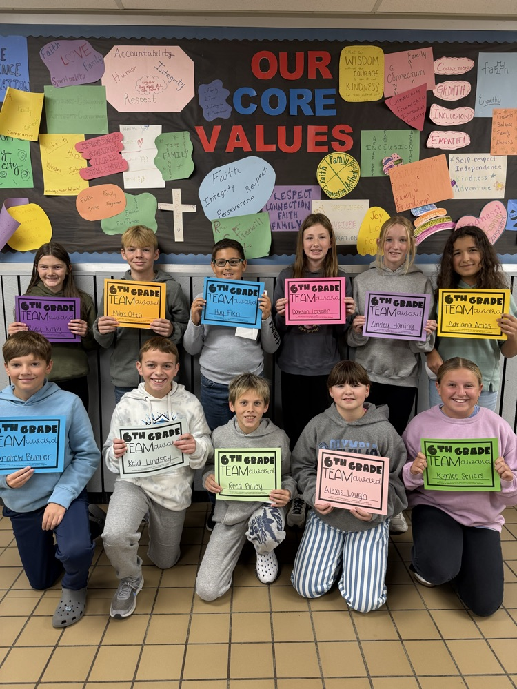 11. Students display their Hall of Fame certificates