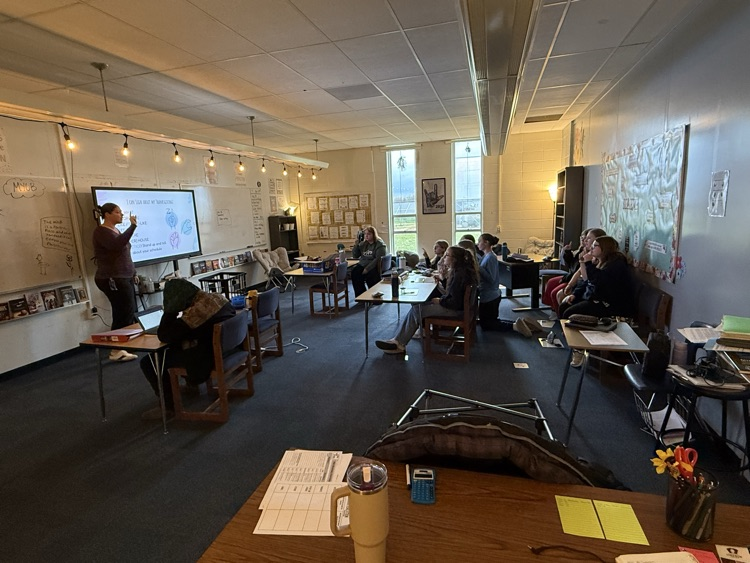 Mrs. Welch teaching new signs