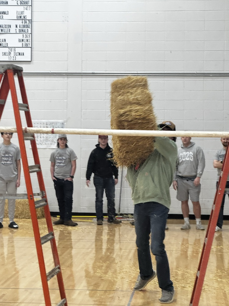 Straw bale toss