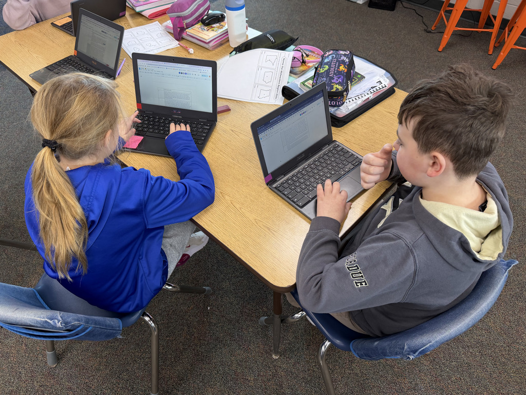 Students writing their AI Prompts