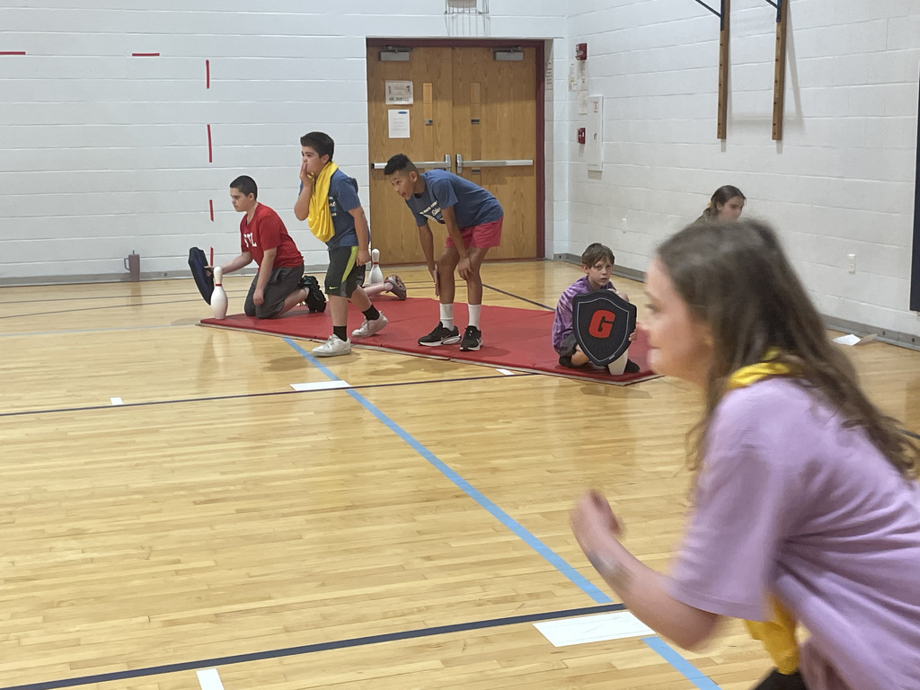 An intense game of dodge ball amongst fifth graders.