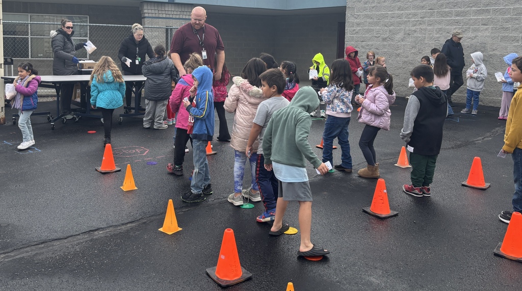 Students patiently waiting in line to cash in for popcorn!