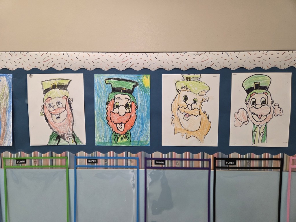 Guided drawing of a leprechaun from 2nd grade students at North Elementary.