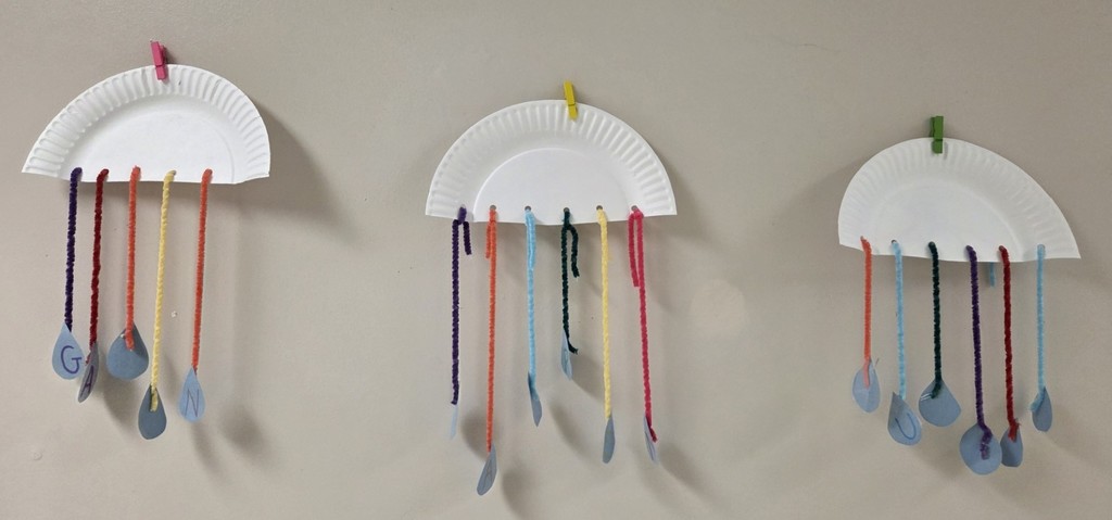 Kindergarten art with raindrops that spell their names.