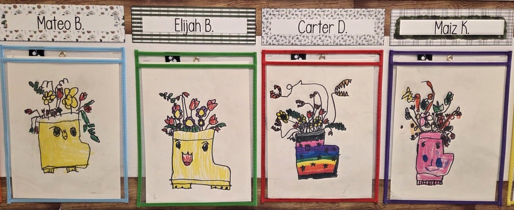 Colorful rain boot vase art with flowers.