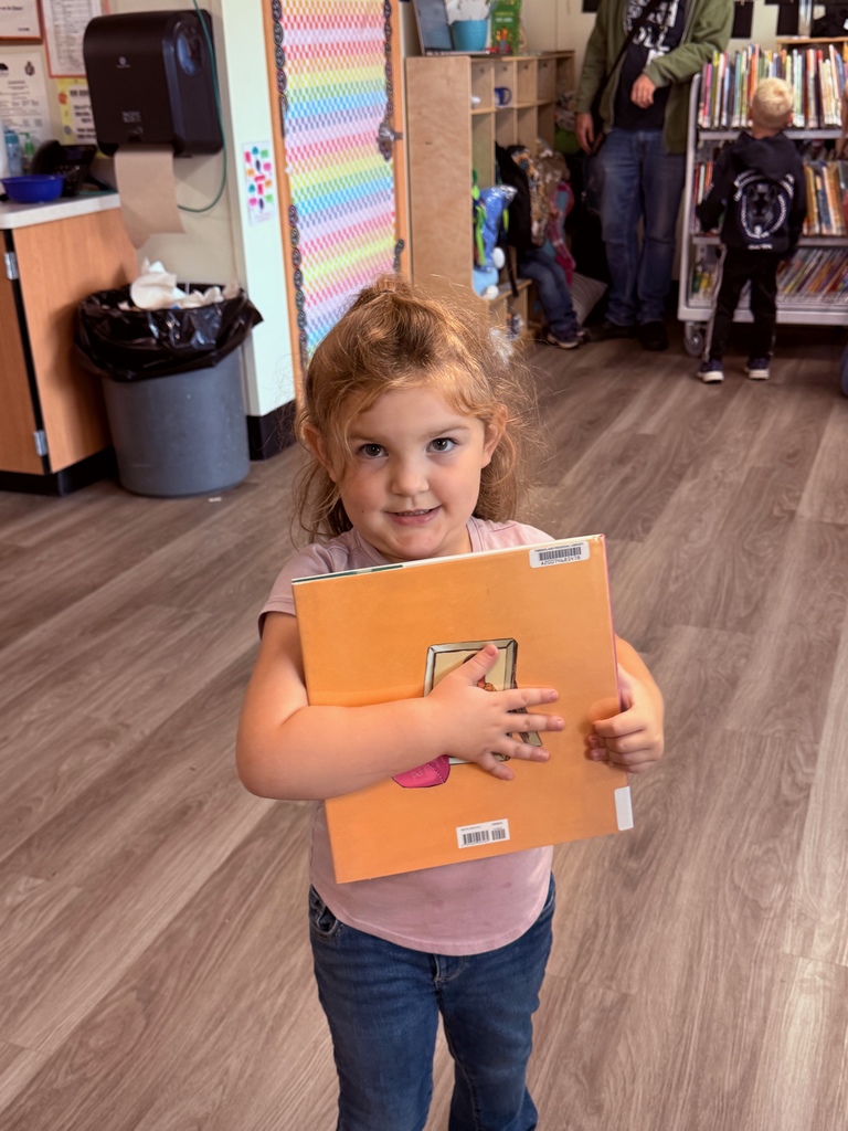 preschool student with book
