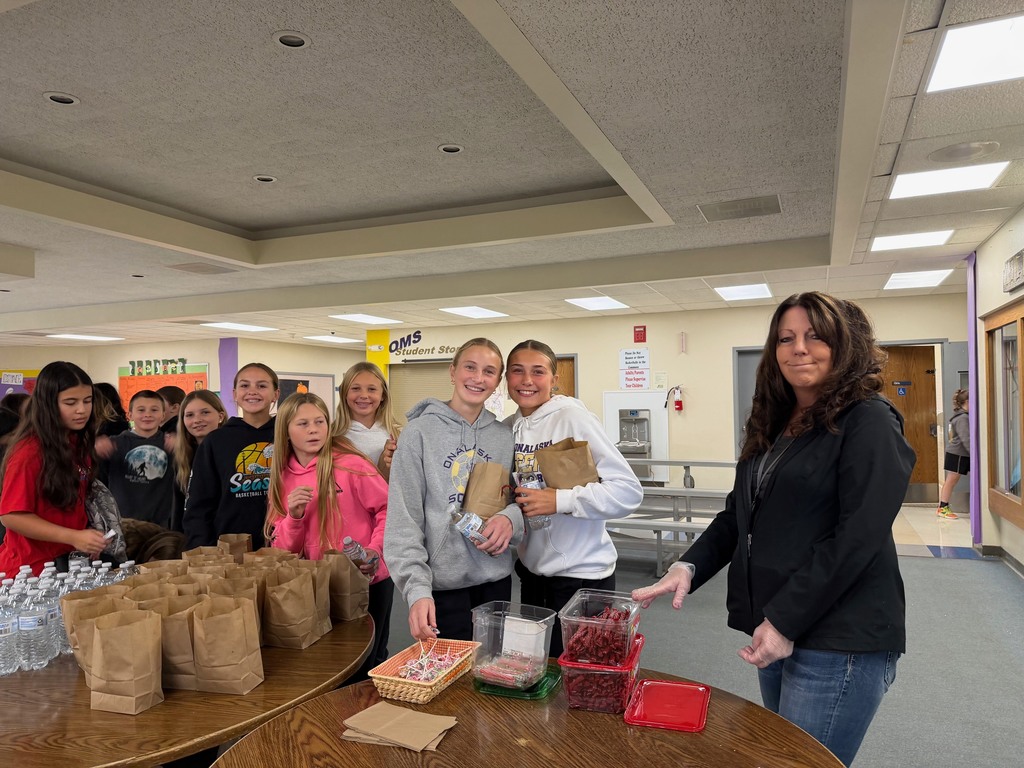 Middle school students and para Henderson