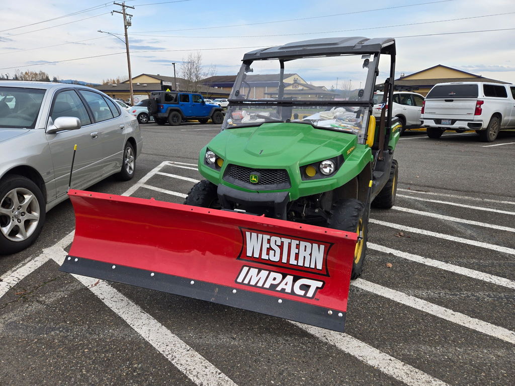 Plow attached to Gator