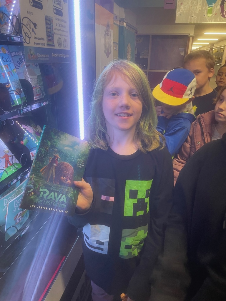 Chole and the book she chose from the vending machine