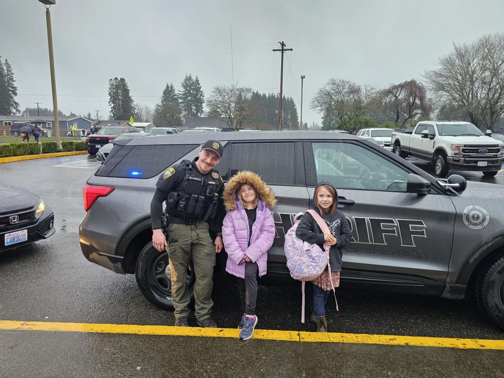 posing with the sheriff