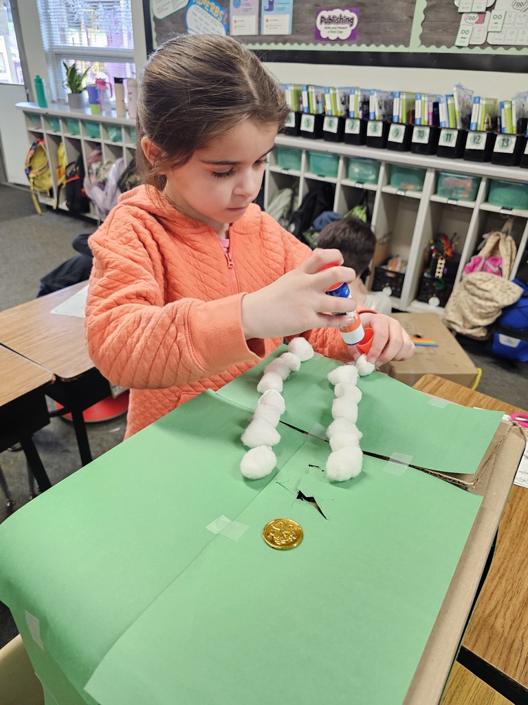 Students building and testing leprechaun traps