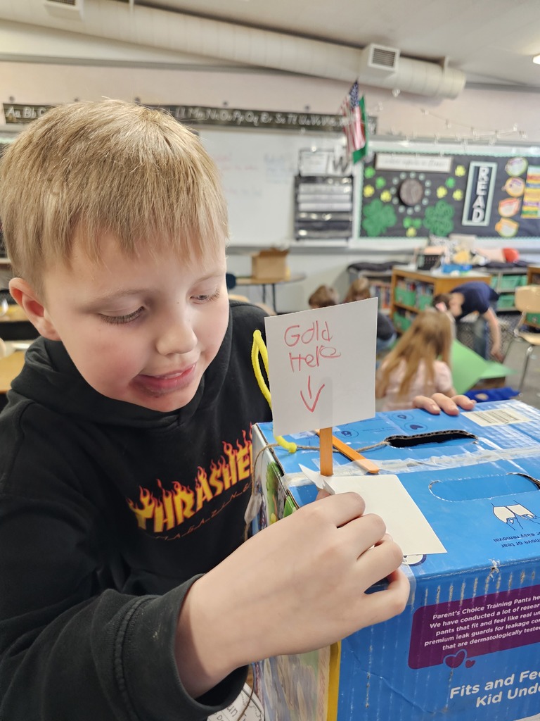 Students building and testing leprechaun traps
