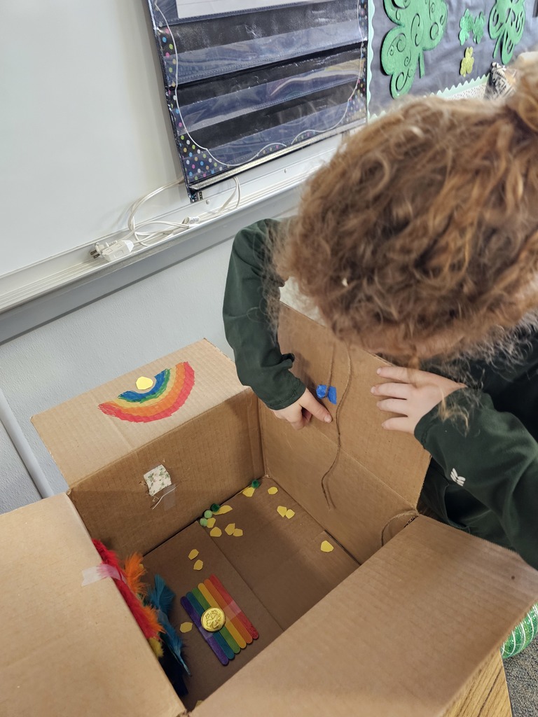 Students building and testing leprechaun traps