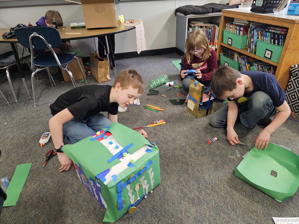 Students building and testing leprechaun traps