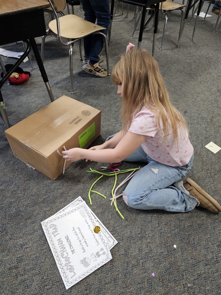 Students building and testing leprechaun traps