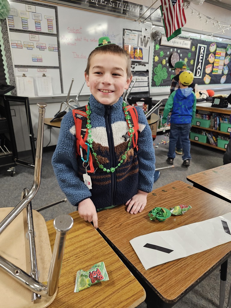 student with leprechaun gear