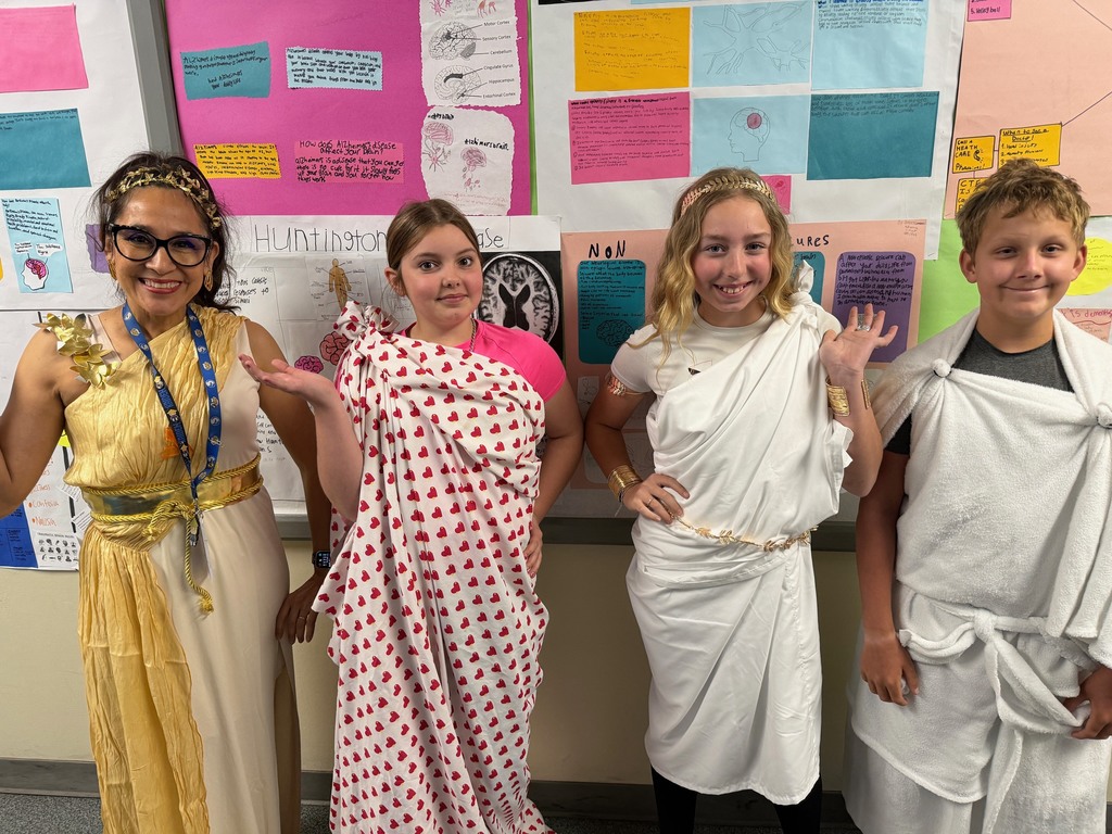 Middle school students dressed up in togas for Mr. Gerbrach's Greek lesson on 4/17/2026