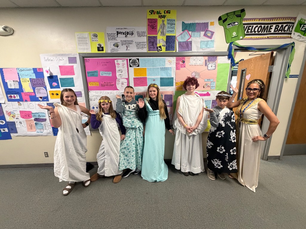 Middle school students, along with Mrs. Richardson dressed up in togas for Mr. Gerbrach's Greek lesson on 4/17/2026