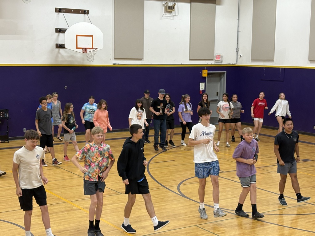 Middle school students dancing