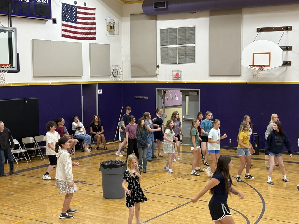 Middle school students dancing