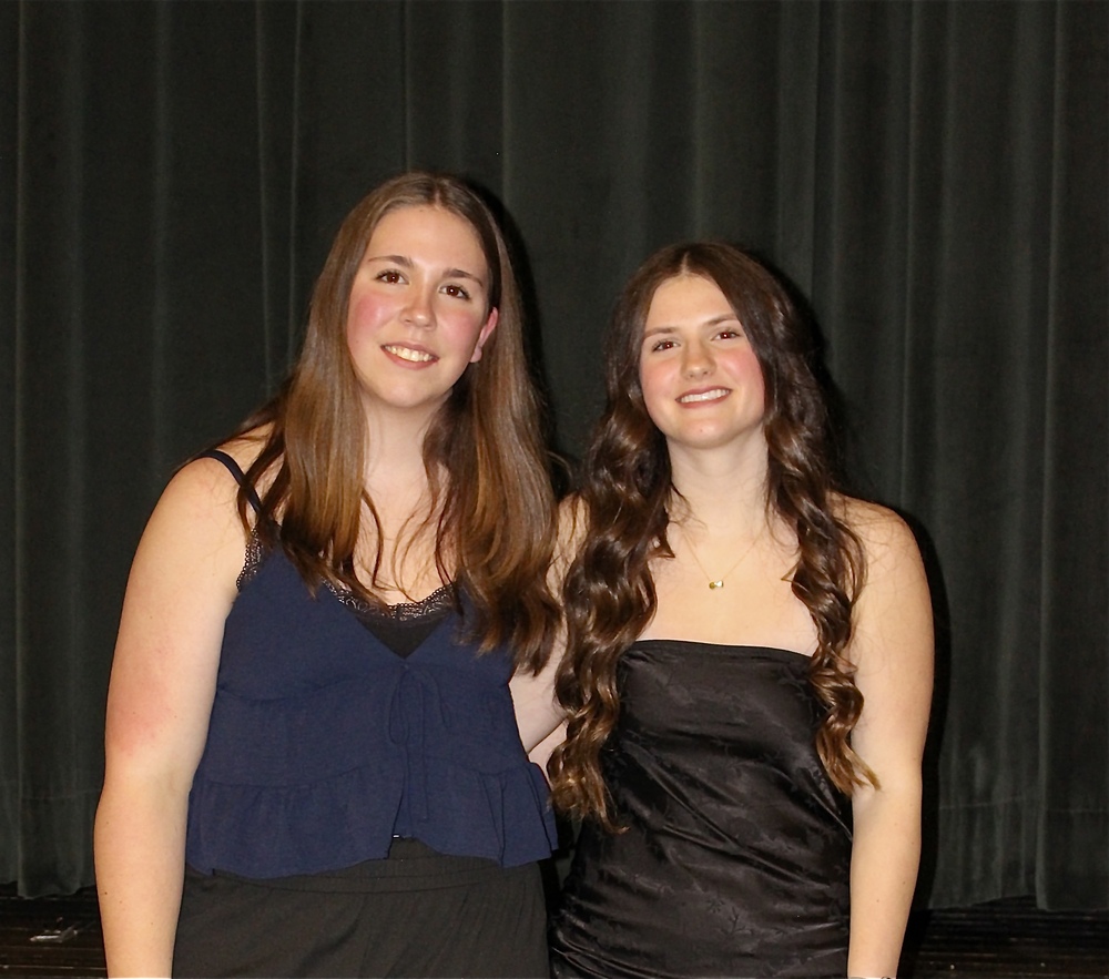 OCS student-journalist Jasmine Lapp (left) poses with senior and friend Aleah Blackmore (right).