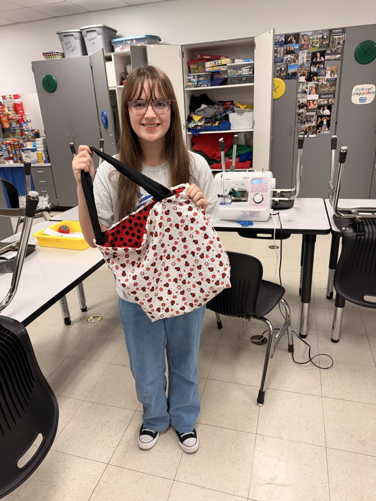 Sewing club member with her completed tote bag