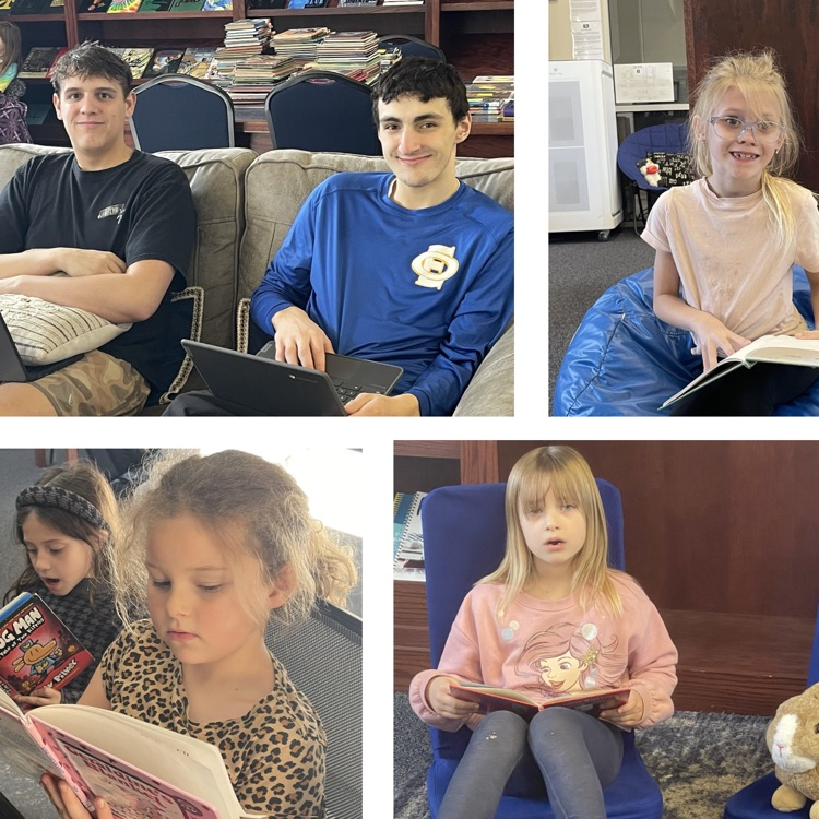 high school and elementary students in the library