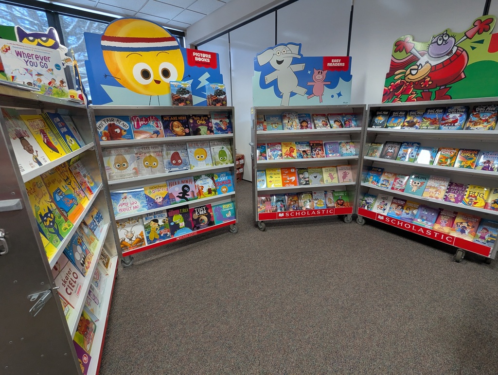 Bookcases filled with children's book for the Scholastic Book Fair 