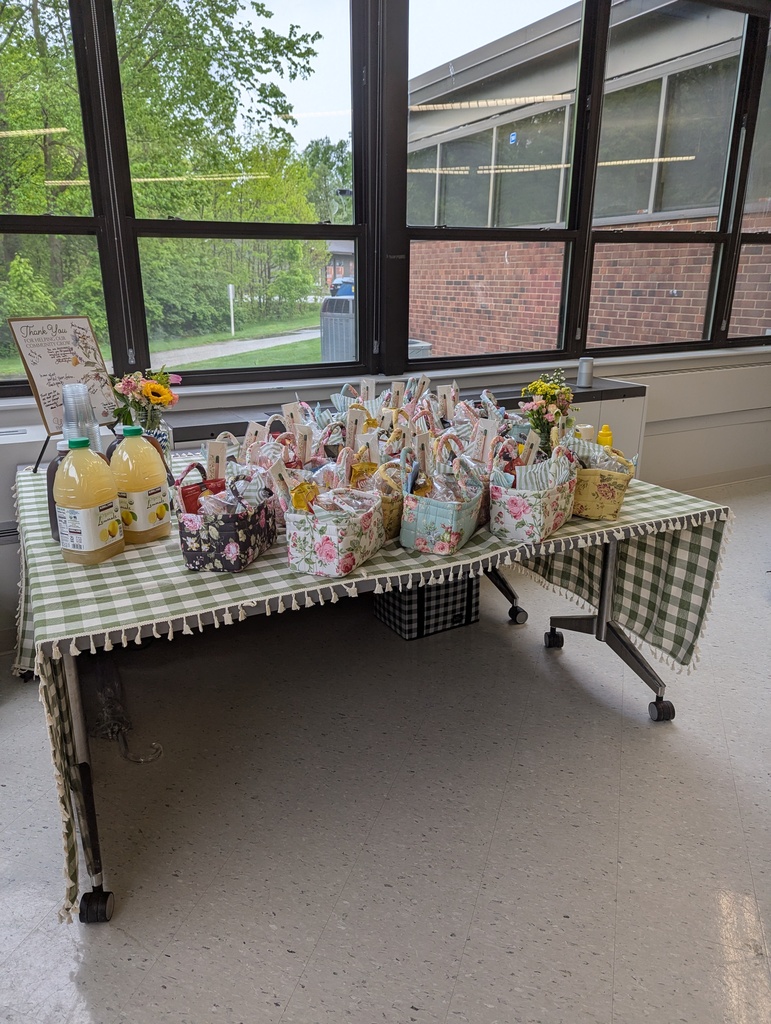 Lunchbags on a table with a tablecloth
