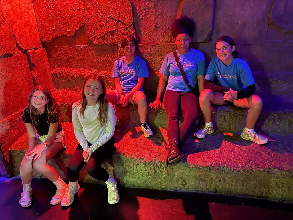 A group of students inside an escape room 
