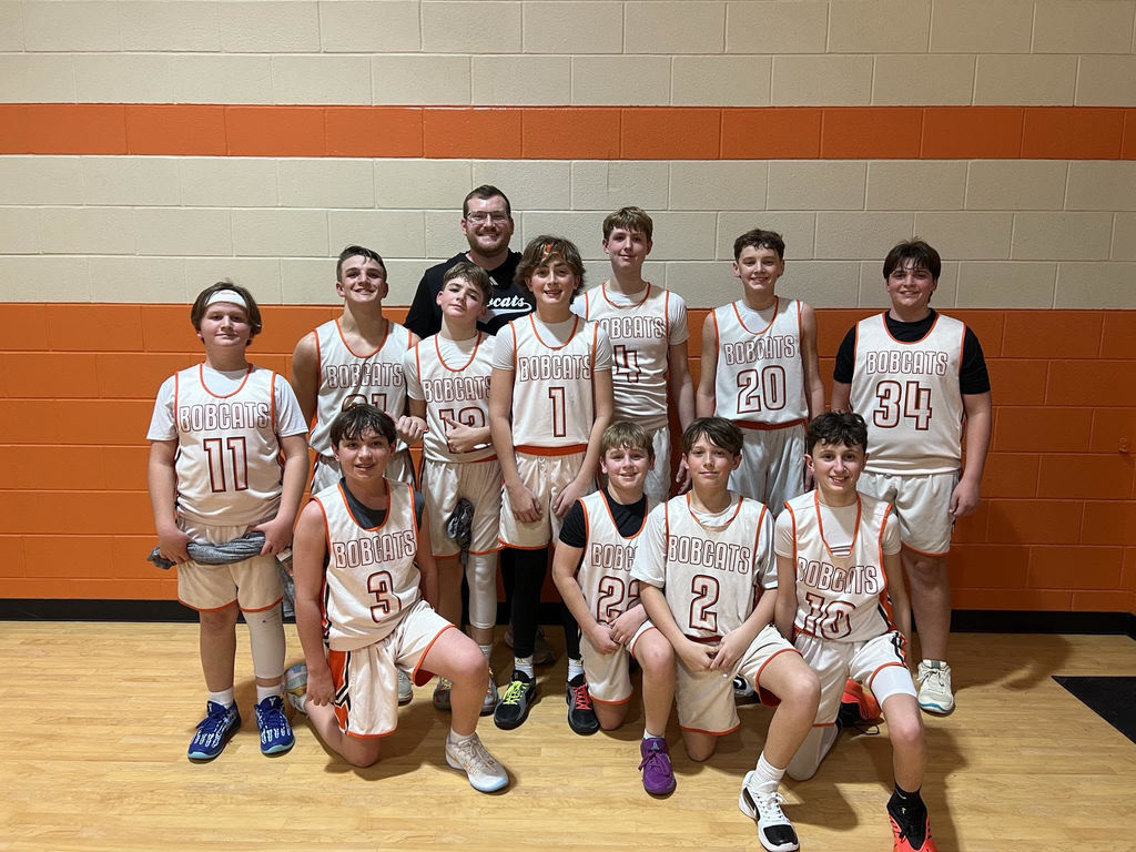 OJH Boys 7th Grade Basketball pose for a group picture.