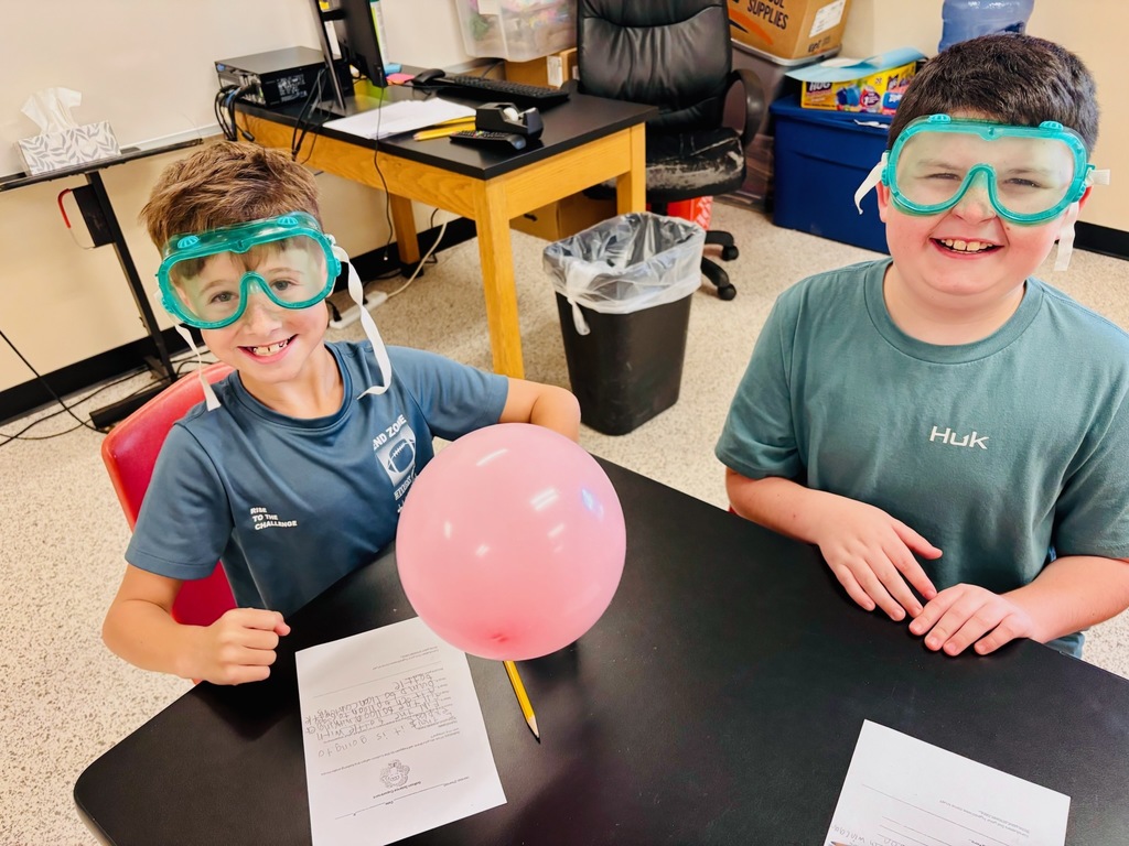Two boys in science lab