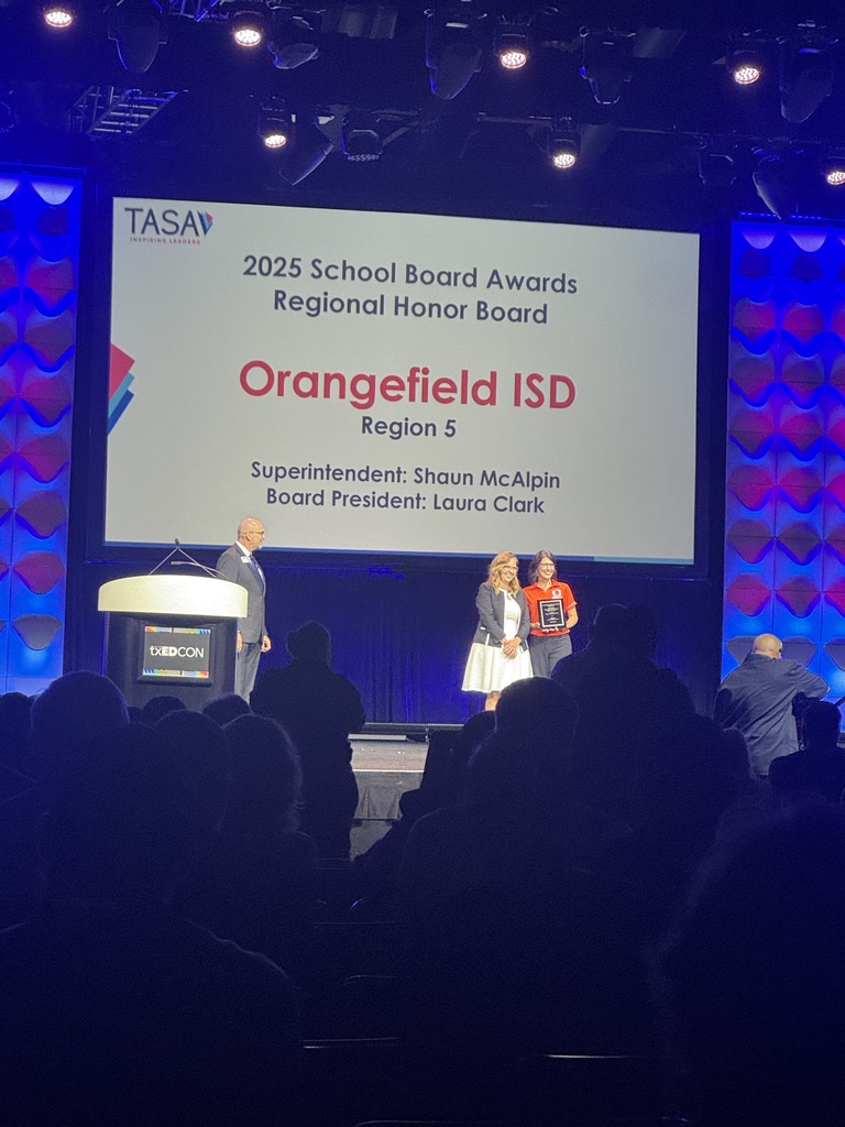 Mrs. Clark accepting the award.