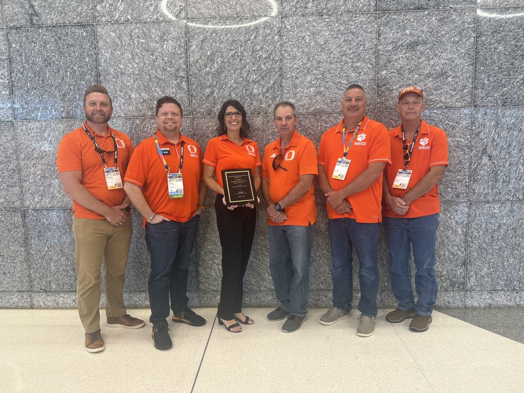 Board Members with Superintendent with their award.