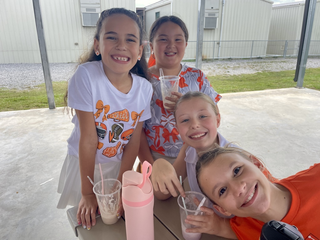 Students enjoyinng treats