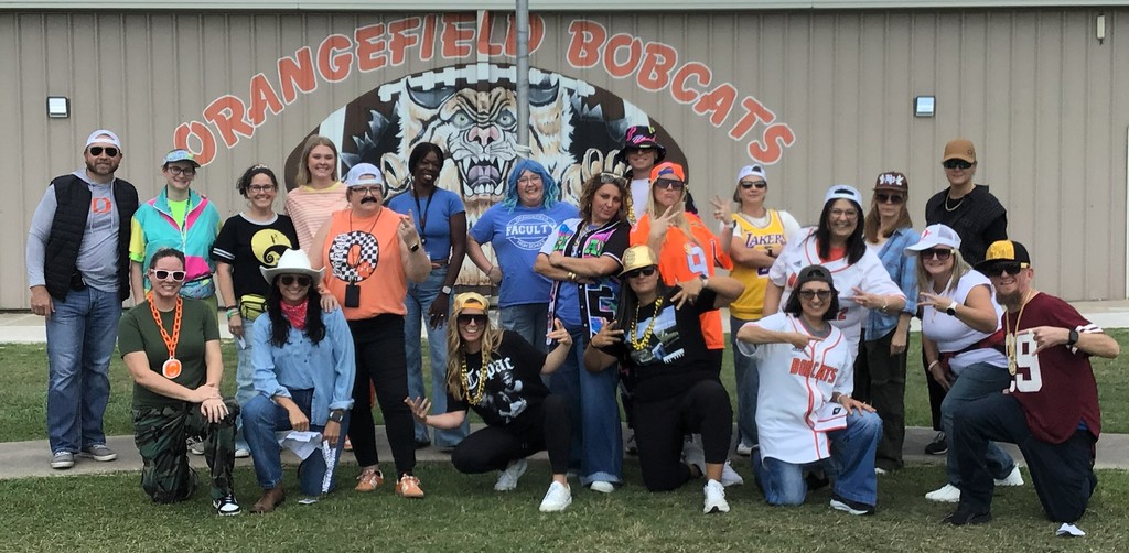 faculty dressed up in 90s gear for the skit