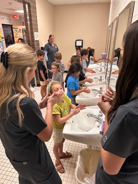 children washing hands