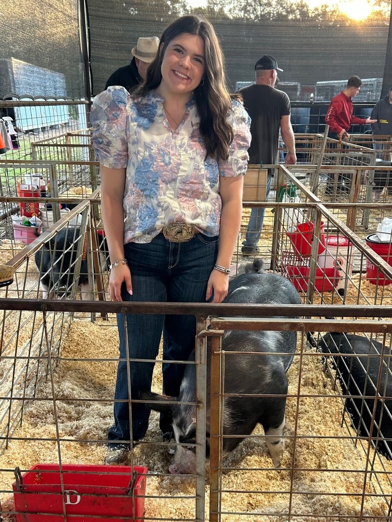 student with show pig