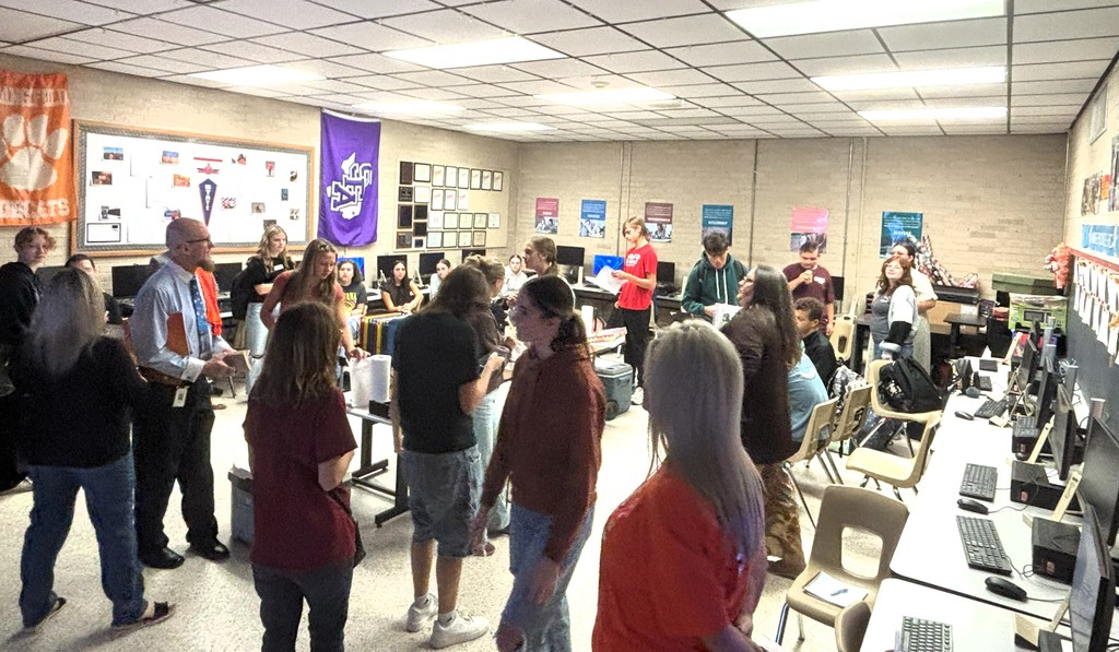 students and teachers mingling