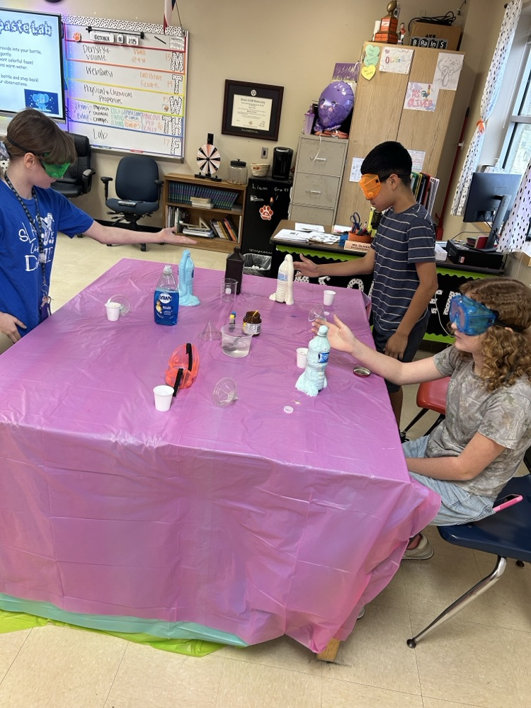 6th grade students completing a science lab