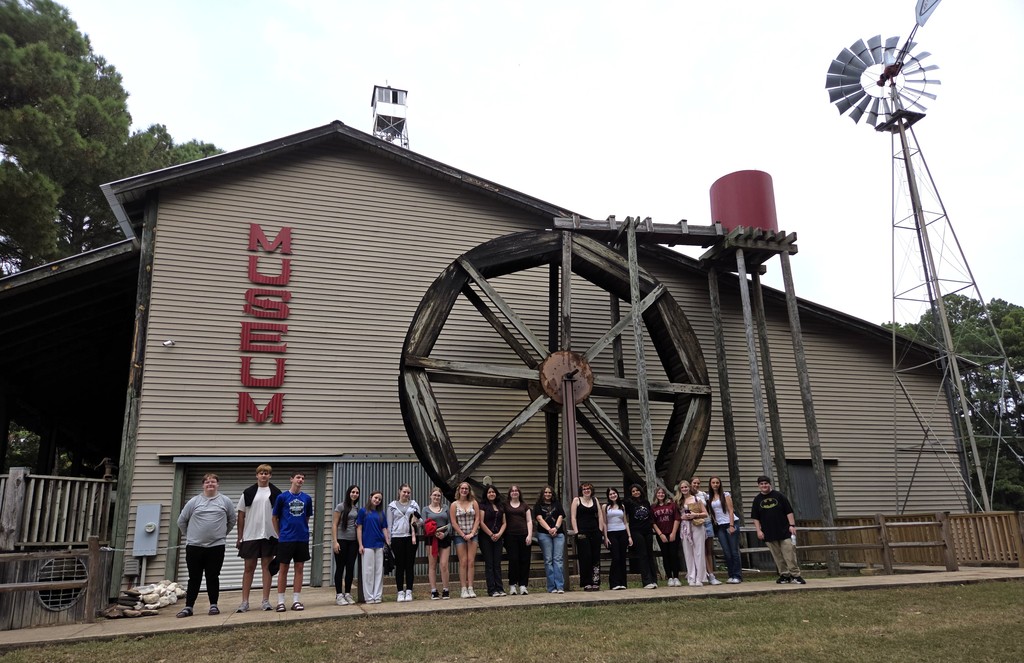 students outside a windmill museum