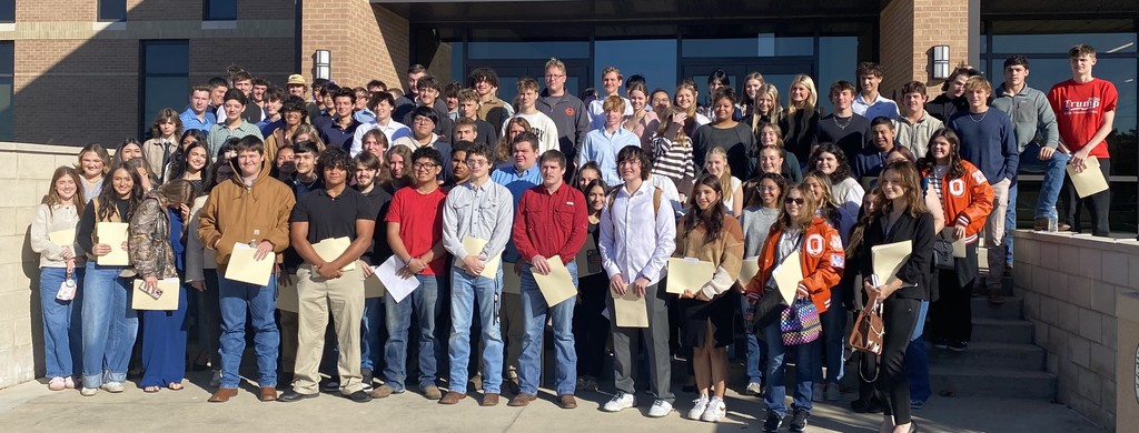 large group of students standing on steps of LSCO