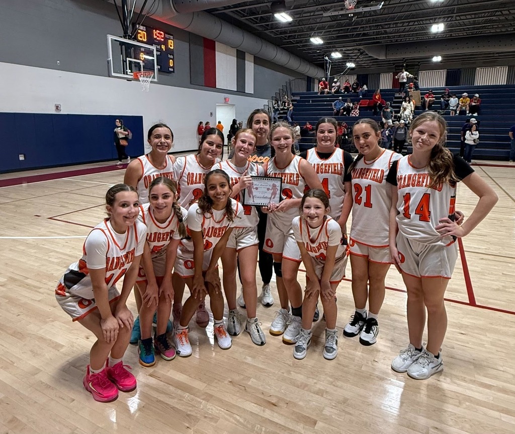 OJH Girls Basketball 7A team pose for a photo for the HJ tournament.
