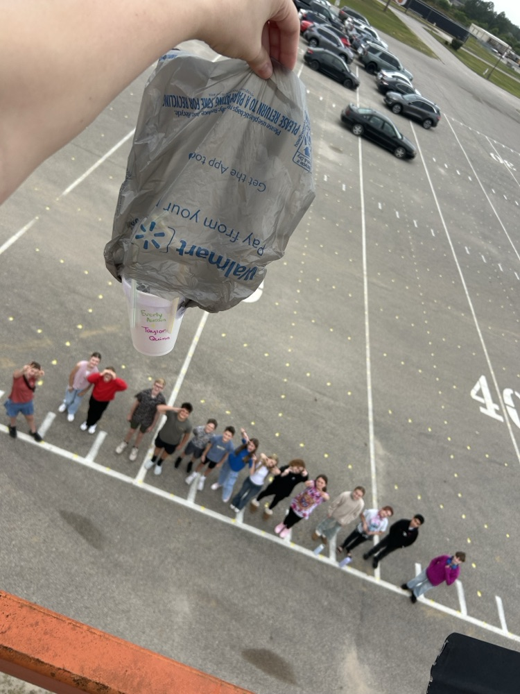 Students watching the eggs take a 25’ drop.