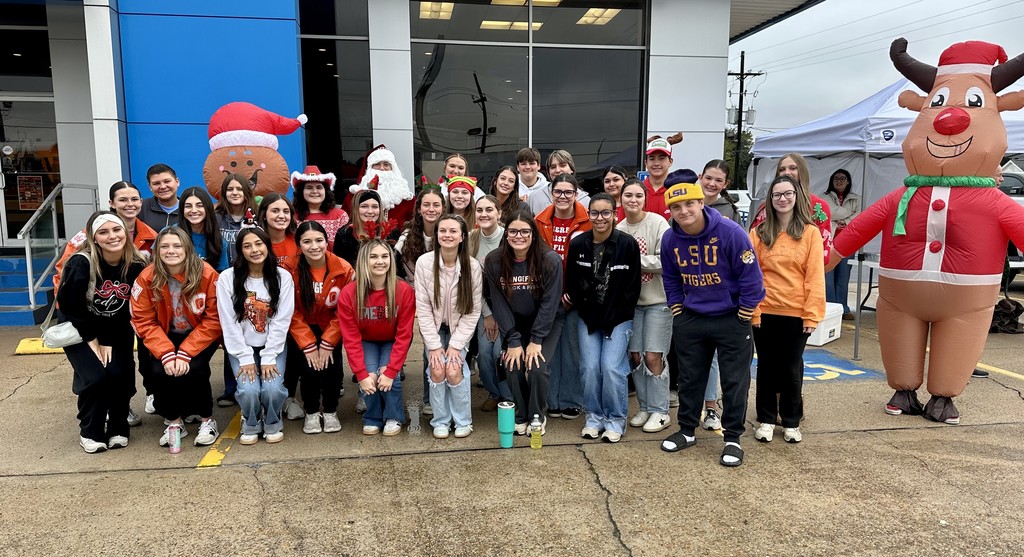 students with gingerbread man and reindeer
