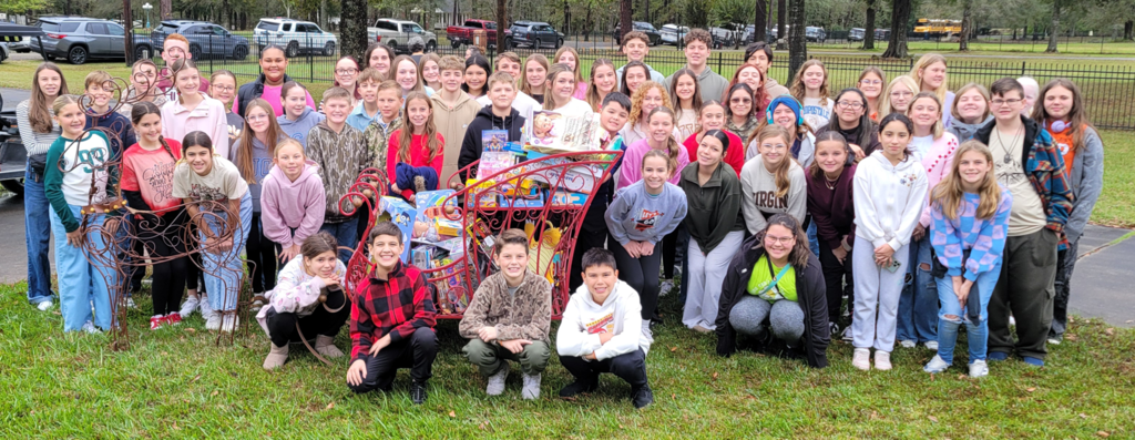 Stuco and NJHS pose for a photo at Toy Coffee.