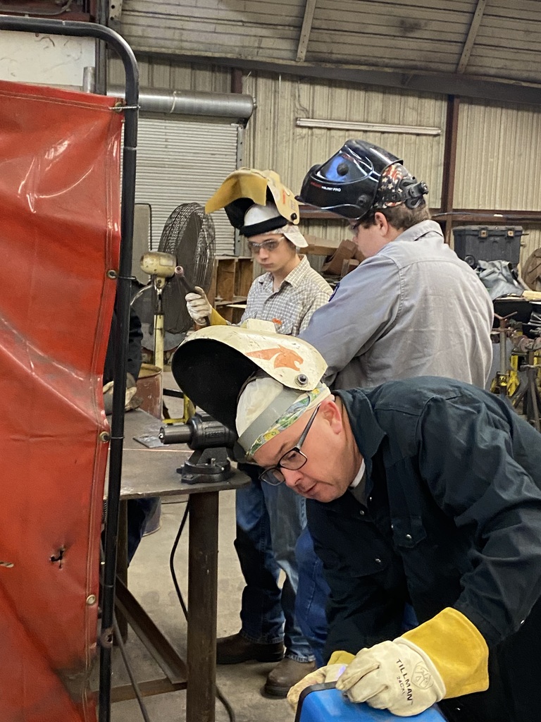 students welding