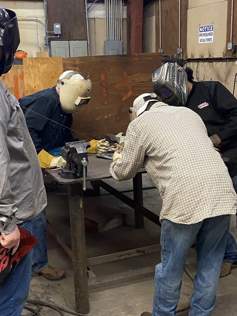 students welding